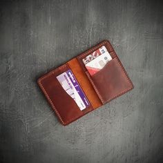 *It is 100% handmade and made of fullgrain leather. *Free customization (name or letter engraving) *Sewn with waxed polyester thread using double needle. *Handmade Personalized Leather Slim Wallet , Small Credit Card wallet, Custom Bifold wallet, gift for him, gift for her, Gifts For Boyfriend  *4 card slots  *2 cash slots Dimensions: Width when closed: 3.15 inches (8 cm) Height: 4.52inches (11.5 cm) Leather Card Holder With Waxed Finish As Gift, Gift Bi-fold Card Holder With Waxed Finish, Brown Waxed Finish Wallets As Gifts, Brown Leather Lined Trifold Wallet As A Gift, Classic Handmade Leather Trifold Wallet, Brown Hand-stitched Card Holder For Gift, Brown Hand-stitched Card Holder Gift, Classic Wallets With Waxed Finish For Gift, Classic Wallets With Waxed Finish As Gift