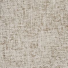 an upholstered fabric textured with brown and white colors, suitable to be used as a background or wallpaper