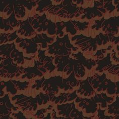 an orange and brown pattern with cats on it