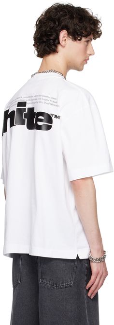 Cotton jersey T-shirt. · Rib knit crewneck · Logo graphic bonded at front and back · Dropped shoulders · Text printed at back Supplier color: White/Black Modern Tops With Logo Detail For Streetwear, Modern White Top With Logo Print, Modern Streetwear Tops With Logo Detail, White Crew Neck Top With Back Print, White Logo Top For Streetwear, White Crew Neck Tops With Logo Detail, White Logo Detail Top For Streetwear, White Oversized Top With Logo, White Crew Neck Top With Logo Detail