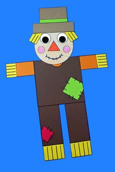 a paper doll made to look like a scarecrow with two eyes and one nose