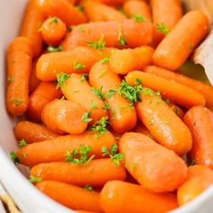 carrots with parsley in a white bowl