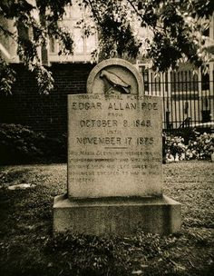 the grave of edgar allen poe in front of his home