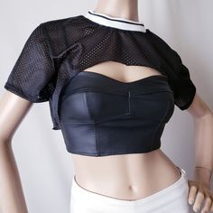 New With Tags. Lightweight Athletic Mesh Crop Top. Features Black & White Ribbing At The Neck. Cropped Above The Chest. Raw Edges At The Bottom. Can Be Worn With Just About Anything. * Only Crop Top Included. 100% Polyester Black Crop Top For Club, Black Tops For Club Nights In Spring, Black Cropped Tops For Club, Black Crop Top For Summer Night Out, Black Crop Top For Club In Spring, Trendy Black Crop Top For Night Out, Black Crop Top For Spring Night Out, Mesh Shirt Outfit, Futuristic Top