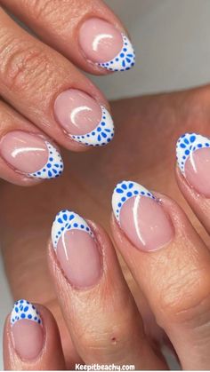 These blue and white french tip nails quite literally nail the coastal granddaughter aesthetic PERFECTLY. I am loving all of these summer nail ideas.   Photo by: @nailsbyswayz White French With Blue Dots, White And Blue Tip Nails, One French Tip Nail, Cute French Tip Almond Nails, White French Tip With Blue Dots, White French Tips With Blue Design, Costal Grandaughter Nails, Funny Nails Design Hilarious, Costal Nail Ideas