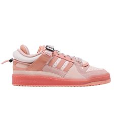 Find ADIDAS Bad Bunny X Forum Buckle Low 'easter Egg on Editorialist. The Bad Bunny x adidas Forum Buckle Low ‘Easter Egg’ represents the pastel-colored follow-up to the duo’s inaugural ‘First Cafe’ collaboration, which preceded this holiday-themed release by less than a month. adidas’ retro hoops shoe is updated with a leather and suede build, rendered in subtle pink and coral hues and revamped with modern details. They include an adjustable ankle strap and doubled-up tongues, both featuring Bad Bunny’s third-eye logo. A durable rubber cupsole with semi-translucent sidewalls anchors the low-top. Adidas Bad Bunny, Adidas Retro, Popular Sneakers, Cream Shoes, Popular Shoes, Sports Sneakers, Trainer Sneakers, Bad Bunny, Low Top Sneakers