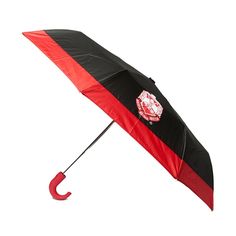 the umbrella is black and red with a manchester united emblem on it's side