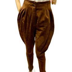 "Maxfield Parrish, Chestnut Suede Jodhpur Styled Trousers, Rare 1980's A wonderful pair of trousers in a soft chamois suede in a rich shade of brown. Designed by Nigel Preston, his label Maxwell Parrish, the name of a famous artist he admired. Preston was a designer who started on the Portobello Road, and became a designer to celebrities, including Suzi Quatro and Julie Andrews, an eclectic audience. These are fantastic a pair of the softest suede pants, high waisted, with button front, the trou Vintage Winter Trousers, Vintage Trousers For Winter, Vintage Full-length Winter Pants, Vintage Full Length Bottoms For Winter, Vintage High Waist Winter Pants, Vintage Brown Pants For Fall, Vintage Pants For Fall, Vintage Trousers For Fall, Vintage Fall Trousers