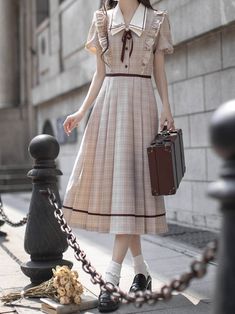 Elevate your Kawaii wardrobe with this charming ensemble! Our light coffee plaid elegant puff sleeves dress is the perfect blend of Lolita and Kawaii fashion. The pleated skirt and elegant puff sleeves add a touch of sophistication, while the light coffee plaid pattern brings a playful and sweet vibe. The dress comes with a matching tie to complete the look. Garment Size SizeSMLXLShoulders35363738Bust86909498Waist66707478Full Length110111.5113114.5 Black Tiered Skirt, Puff Sleeves Dress, Steampunk Fashion Female, Plaid Pleated Skirt, Elegant Skirt, Dress With Tie, Fashion Mode, Outfits With Hats, Lolita Dress