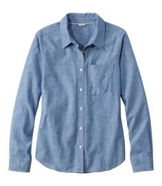 Amazingly soft and light, our most versatile cotton chambray shirt looks great on its own or layered. With an easy fit to always feel comfortable. Falls at low hip. Relaxed Fit: Our most generous fit sits farthest from the body. 100% cotton indigo chambray. Machine wash and dry. Slightly curved hem. Single chest pocket. Button-front placket and buttoned cuffs. Imported. Fit: Relaxed Fit | Women's Essential Cotton Shirt, Chambray Long Sleeve Womens Chambray Shirt, Blue Work Shirt, Core Wardrobe, Farm Clothes, Chic Jeans, Women's Button Down Shirt, Women Essentials, Chambray Shirt, Women's Shirts