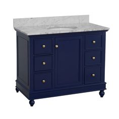 a bathroom vanity with marble top and blue cabinetry on the bottom, against a white background