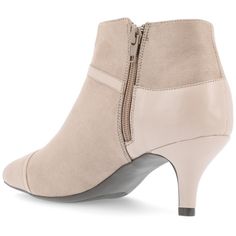 Introducing Embrie, the chic and minimalistic bootie from Journee Collection that will give your dressed-up fall look the finishing touch it needs. Made from vegan leather with two-tone accents, Embrie features an easy-to-use zipper entry, pointed-toe, and 2 1/2-in stiletto heel, making it perfect for any special occasion. With a 4 mm Tru Comfort Foam™ insole, Embrie ensures comfort all day long, so you can look great and feel fabulous. Journee Collection, Fall Looks, The Chic, Stiletto Heel, Boot Shoes Women, A 4, Bootie, Bootie Boots, Stiletto Heels