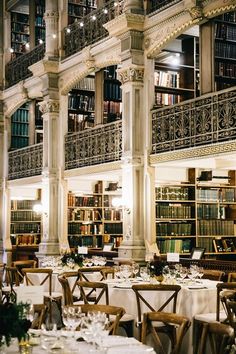 the library is full of books and dining tables