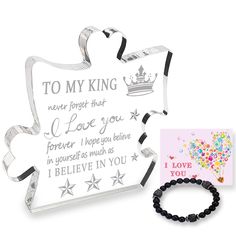 a bracelet and card are shown next to it's gift box with the message, to my king never forget that i love you