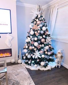 a decorated christmas tree in a living room