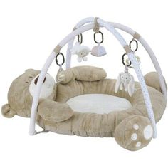 a teddy bear playpen with stuffed animals on it