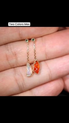 ABOUT THIS PRODUCTSolid 18k Yellow GoldMexican Fire Opal: 0.875 ct2 Tsavorite: 0.046 ctMetal Color: GoldenOpal Color: Red & RainbowStyle: Drop, Push BackEarring Size: 23 x 4.5 mmOccasion: Birthday/Anniversary Yellow Gold Tsavorite Earrings As Gift, Tsavorite Earrings Gift For May Birthstone, Tsavorite Earrings For May Birthstone Gift, Tsavorite Yellow Gold Earrings For Gift, Tsavorite Gemstone Earrings For May Birthstone, Gold Tsavorite Earrings Fine Jewelry, Yellow Gold Tsavorite Earrings Fine Jewelry, Gold Tsavorite Gemstone Earrings, Yellow Gold Tsavorite Gemstone Earrings