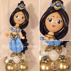 there is a figurine that looks like a girl on top of some balloons