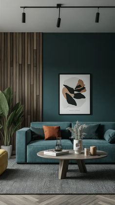 a living room with green walls and wood paneling on the wall, two couches and a coffee table