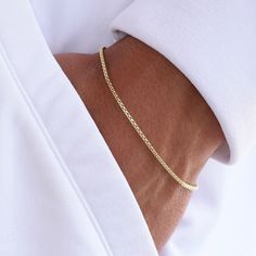 "14K Gold Men's Chain Bracelet 14K gold 1.7mm Hollow Rounded Box Chain 14K gold rectangle lobster clasp All components are 14K yellow gold *The length includes the chain and the closure. Please measure your wrist before you place your order. ** How to choose a correct size of bracelet. 1. Measure your wrist below the wrist bone using a flexible tape measures, a string or a strip of paper. 2. If using a string or a strip of paper, mark length. Then, measure it with a ruler. 3. To find the bracele Gold Bracelet Simple Men, Gold Wheat Chain Bracelets As Gift, Yellow Gold Bracelets With Wheat Chain As A Gift, Gold Wheat Chain Bracelet As Gift, Gold Rectangular Tennis Bracelet As A Gift, Gold Wheat Chain Bracelet Gift, Minimalist Gold Chain Bracelet With Adjustable Length, 14k Gold Wheat Chain Bracelet Gift, Classic Rectangular Gold Tennis Bracelet