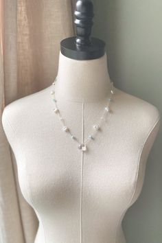 This lovely handmade sterling silver beaded necklace is expertly crafted to showcase the captivating beauty of crystal quartz and keshi pearls. The focal point of this exquisite piece is the clear, sparkling crystal quartz, surrounded by uniquely shaped keshi pearls and soothing aqua amazonite beads. Each element has been thoughtfully selected to create a harmonious blend of elegance and artistry, making it a perfect accessory for both casual outings and special occasions.The lightweight design ensures comfortable all-day wear, and the high-quality sterling silver chain promises durability and longevity. Necklace length: adjustable 18-20.5 inches Materials: crystal quartz, keshi pearls, aqua amazonite, sterling silver Gift box included. Free shipping on US orders 30-day free returns Our ha Silver Beaded Necklace, Silver Gift Box, Gemstone Beads Jewelry, Silver Bead Necklace, Keshi Pearls, Birthstone Charms, Sparkling Crystal, Crystal Quartz, Handmade Sterling Silver