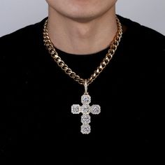 Introducing the Frostbite™. Crafted in 10K gold, this crucifix-style cross pendant emits divine radiance. Its halo design is sure to make you shine.