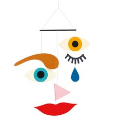 a drawing of a face with blue eyes and red lips hanging from a string on a white background