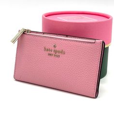 Brand New With Tag Kate Spade Leila Small Slim Bifold Wallet Product Details Color: Bright Carnation 3.1" H X 5.5" W X 0.9" D Pebbled Leather Ksny Metal Pinmount Logo Two Way Spade Jacquard Lining Interior: 5 Credit Card Slots, Id Window, 2 Slip Pockets Exterior: Top Zip Coin Compartment On Front Of Wallet Snap Closure Dust Bag Not Included Imported Compact Pink Coin Purse For Travel, Feminine Pink Wallets For Daily Use, Compact Pink Travel Coin Purse, Elegant Pink Bifold Coin Purse, Pink Wallet With Zipper Closure For Daily Use, Chic Pink Wallet With Zipper Closure, Chic Pink Coin Purse For Everyday Use, Chic Pink Coin Purse For Everyday, Pink Feminine Wallet For Everyday Use