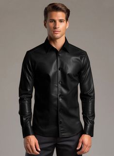 A true fashion piece that offers an edgy flair to your classy ensemble with lasting perfection is our Regal Black Leather Shirt. Tailored from pure napa leather, our black shirt boasts astonishing detailing and all-day comfort, offering a style endeavor beyond compare.  Be the owner of the finest leather shirt that will enhance your overall look for your next casual hangout or chill aura at an art opening gala. Shop today!   Made Using Pure Napa Sheep Skin Soft Leather    Look Includes     Black    Default Buttons     Click 'Customize Now' to modify the look if needed.    Made as per your measurements. Italian Shirts, Tweed Pants, Sheep Skin, Linen Suits, Linen Jackets, Tweed Suits, Tuxedo Jacket, Leather Shirt