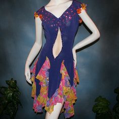 will fit size 5/6-11/12, very stretchy Be bold and express yourself in this Latin-rhythm dress that converts to a ballroom dress, crafted from luxurious deep periwinkle purple slinky stretch fabric featuring vibrant floral print accents. The eye-catching details don't stop there: embellishments of silk flowers & Swarovski rhinestones add a touch of sparkle, while the wrap-style long skirt brings movement and drama with yards of petal-like chiffon panels. A great buy, as to have a similar custom Deep Periwinkle, Periwinkle Purple, Latin Dress, Ballroom Dress, Floral Chiffon, Be Bold, Tropical Print, Ballroom, Silk Flowers