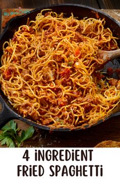 four ingredient fried spaghetti in a cast iron skillet with text overlay that reads, 4 ingredient fried spaghetti in a cast iron skillet