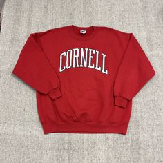 ITEM : Vintage Cornell Sweatshirt XL Red 1990s University   Size on Tag : XL  Flaws :  Measurements : Please Refer to Photos For Measurements  USA Buyers Will Not Be Charged Customs / Duties All Items Are Shipped Through  A Freight Forwarder In NY State & Processed With USPS / UPS. Please advise not all Items Fit to The Given Tag Size Refer To Measurements Shown Please Feel Free to Ask Any questions you may have Oversized Red Collegiate Top, Red Oversized 90s Tops, Oversized 90s Red Top, Retro Red College Tops, Retro Red Tops For College, Red Retro Tops For College, Retro Red Cotton Sweatshirt, Retro Red Oversized Top, Oversized Retro Red T-shirt