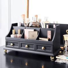 Storing your beauty and makeup essentials is so much more fun when you have a chic organizer! Featuring a pretty asphalt hue with gold accents, it's complete with 16 compartments and three drawers to Regency Makeup, Cosmetics Organization, Rebellious Aesthetic, Teen Storage, Chic Organization, Desk Organiser, Emily And Meritt, Salon Suites, Beauty Organization