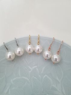 Gold, Silver or Rose Gold 10mm swarovski pearl earrings Matching necklace; https://www.etsy.com/listing/233080328/bridesmaid-necklace-gold-necklace-with Classic White Pearl Earrings For Bridesmaid Gift, Pearl Earrings For Bridesmaid Gift, White Round Bridal Earrings For Bridesmaid Gift, White Bridal Earrings For Bridesmaid Gift, White Round Bridal Earrings For Bridesmaid, White Round Pearl Earrings For Bridesmaid Gift, Hypoallergenic Round Pearl Beads Earrings For Wedding, Gold Bridesmaid Necklace, Earrings Matching