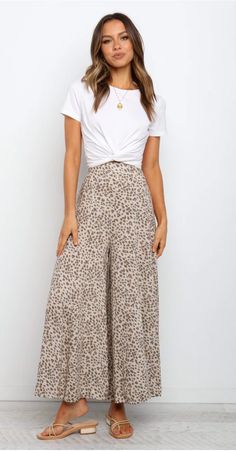 These pants are the perfect addition to your wardrobe! With a high waisted fit and elasticised back, they are lightweight and comfortable for all day wear. The relaxed fit will give you plenty of room to move, while still giving you an elevated look that is sure to turn heads.

    high waisted
    elasticised at back
    lightweight
    unlined House Wear Outfits Casual, Relaxed High Waist Wide Leg Pants For Spring, Versatile Beige High-waisted Wide Leg Pants, Effortless Wide Leg Pants With Elastic Waistband, Casual Neutral Bottoms For Vacation, Relaxed High Waist Pants For Spring, Relaxed High Waist Spring Pants, Versatile High Waist Beige Bottoms, Neutral Bottoms With Elastic Waistband For Vacation