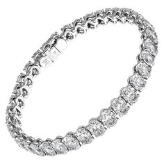 Diamond Tennis Bracelet Timeless and classic! Not your typical tennis bracelet - ovals bring nice elegant touch and look twice bigger then round diamonds - truly a statement piece Mounted in Platinum with 37 Oval diamonds - each one GIA certified - totaling 18.67ct (0.5 ct each stone): • 0.50ct IF E GIA#6213189820 • 0.50ct VVS1 E GIA#2366289526 • 0.50ct VVS2 D GIA#6217217702 • 0.50ct VVS2 E GIA#1367485419 • 0.51ct VVS2 E GIA#2215233896 • 0.50ct VS1 D GIA#5212261290 • 0.50ct VS1 D GIA#2211144664 Luxury Oval Tennis Bracelet, Luxury Oval Tennis Bracelet For Wedding, Luxury Elegant Oval Diamond Bracelet, Luxury Modern Oval Diamond Bracelet, Luxury Oval Diamond Bracelet, Wedding Jewellery Designs, Expensive Jewelry Luxury, Diamond Tennis Bracelet, Expensive Jewelry