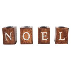 three wooden blocks that spell out the word noel