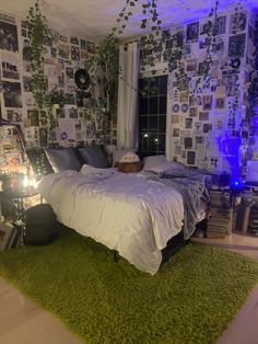 a bedroom with green carpet and white walls