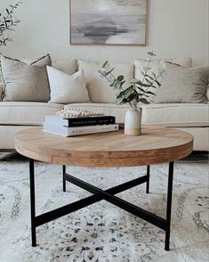 Wooden coffee table Round Neutral Coffee Table, Modern Farmhouse Living Room Round Coffee Table, Living Room With No Table, Simplistic Coffee Table Decor, Round Coffee Table 2022, Farmhouse Modern Coffee Table, Living Room With Wood Coffee Table, Neutral Living Room Black Coffee Table, Round Farmhouse Living Room Table