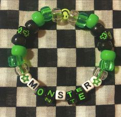 Scene Bracelets Aesthetic, Monster Energy Bracelet, Alt Beaded Bracelets, Beaded Bracelets Kandi, Cute Kandi Bracelet Ideas, Beaded Bracelets Aesthetic Grunge, Emo Bracelets Diy, Double Kandi Bracelet Tutorial, Word Ideas For Bracelets