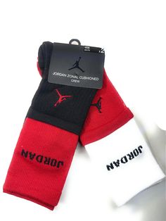 NIKEJORDAN AIR 2-Pairs HIGH CREW SOCKS Big Kids Sock Size 6-7 or Shoe Size 5Y -7Y  Is your kid also a Jordan lover down to his socks? Then these Jordan High Crew Socks are shouting their name. There's a JORDAN branding on the outerside of each sock that lets everybody know they represent that Jumpman to the fullest. Not only do these look good, they feel good, too.Up your Jordan game with these Air Jordan High Crew Socks. FEATURES:FABRIC: Dri-FIT 98% Polyester /2% SpandexQUANTITY: 2 pairColor: R Casual Red Socks For Streetwear, Sporty Red Cotton Socks, Casual Breathable Red Socks, Casual Red Breathable Socks, Non-slip Casual Sports Socks, Casual Non-slip Socks For Sports Events, Red Casual Sports Socks, Casual Red Sports Socks, Red Sporty Socks For Sports