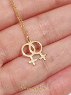 A delicate 14K or 9K solid gold necklace with a double female symbol charm.

Whisper...Love has no gender! Lesbian Symbol, Love Has No Gender, Venus Necklace, Whisper Love, Couple Gifts For Her, Solid Gold Charms, Female Symbol, Symbol Necklace, Solid Gold Necklace