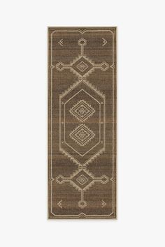 a brown and white rug with an intricate design