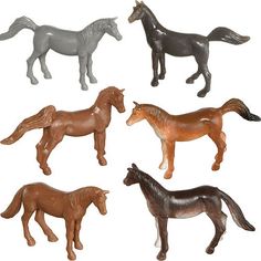 six plastic horses standing in a row on a white background