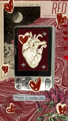 an old cell phone with hearts drawn on it's screen and the text maybe in another life?