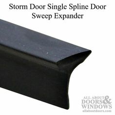 a black door handle with the words storm door single spline door sweep expander