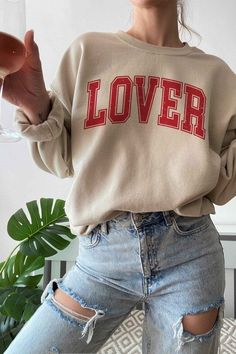 LOVER VALENTINES GRAPHIC SWEATSHIRTPREMIUM COTTONUNISEX SIZINGCLASSIC FITMade In: USA Valentines Graphic, Affiliate Blogging, Judy Blue Jeans, Romper Dress, Chic Boutique, Shirts Tops, Jumpsuit Romper, Made In Usa, Ash