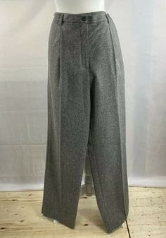 Women’s Vintage Gray Tweed Wool Blend Slacks Liz Claiborne Wool Pants. Excellent pre owned vintage condition No stains rips holes no missing buttons zipper is fully functional no loose stitching Fully lined with gray satin poly which is also in perfect condition Pleated front side reach in vertical slit pockets and 1 back horizontal slit pocket with button closure 1.5 inch high belt loops Zip and top button closure button measures a half inch zipper measures 7 inches Fabric is wool poly cotton n Tweed Pants, Grey Tweed, Wool Pants, Liz Claiborne, Wool Blend, Pants For Women, Trousers, Black And White, Wool