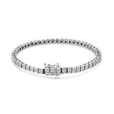 Beautiful and elegant, this silver tennis bracelet has a timeless design that will never go out of style. With a total diamond weight of 1/2 cttw, this bracelet is embellished with sparkling lab grown diamonds in a miracle plate setting. This piece is crafted with genuine .925 sterling silver, plated with rhodium (a platinum-family metal) for a lifetime of tarnish-free wear. This bracelet is the perfect bling for your everyday wear or your night out; its brilliance lies in its versatility. White Gold Tennis Bracelet With Diamond Accents, Classic Silver Tennis Bracelet With Single Cut Diamonds, Anniversary White Gold Tennis Bracelet With Diamond Accents, Fine Jewelry Silver Tennis Bracelet With Single Cut Diamonds, Plate Setting, Silver Tennis Bracelet, A Miracle, Stylish Watches, Tennis Bracelet