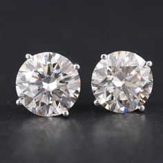 Absolute Stunners ~ These 3.95ct Round Brilliant Diamond Earrings in 14K white gold settings, will sure to please. They are perfection! Materials:14K Gold Earring Type:Stud Earring Closure Type:Threaded Post Total Weight (grams):2.40 Primary Stone(s) Type:Diamond Primary Stone(s) Details:Created Primary Stone(s) Shape:Round Cut Total Primary Stone(s) Carat Weight:3.95 ctw - 4.11 ctw Primary Stone(s) Color Grade:J - K Primary Stone(s) Clarity Grade:VS2 - SI1 Gold Earring, Earring Type, Brilliant Diamond, Stud Earring, Round Brilliant, Gold Earrings, Diamond Earrings, White Gold, Gems